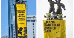 Aktivis Greenpeace membentangkan spanduk protes dari atas Patung Selamat Datang pada Selasa, 20 Oktober 2026. (Sumber: X/@ejaaipongg)