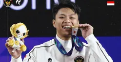 Atlet angkat besi Rahmat Erwin Abdullah berhasil menambah perolehan medali emas bagi Indonesia di Asian Games 2026. (Sumber: Instagram/@timindonesiaofficial)