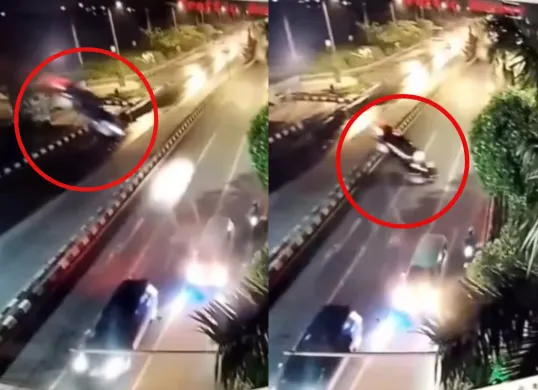 Mobil sedan terjun dari Tol Krian-Gresik hingga menghantam ruas jalan raya. (Sumber: Tangkap Layar Instagram/@medsoszone)
