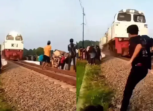 Aksi berbahaya para pemuda yang menantang kereta api di perlintasan. (Sumber: Tangkap Layar Instagram/@fakta.indo)