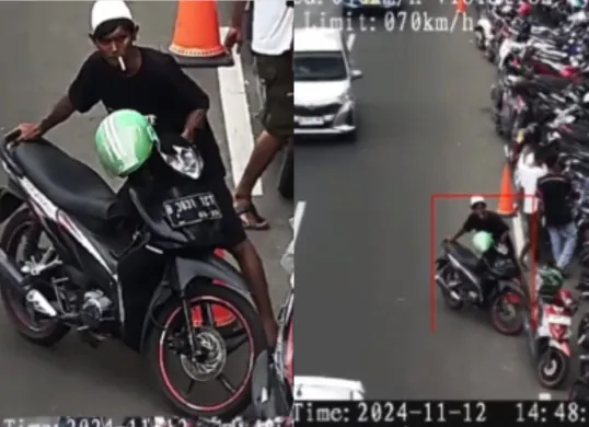 Juru parkir kena tilang ETLE saat memindahkan motor terdekteksi tidak mengenakan helm. (Sumber: Instagram/@medsos_rame)