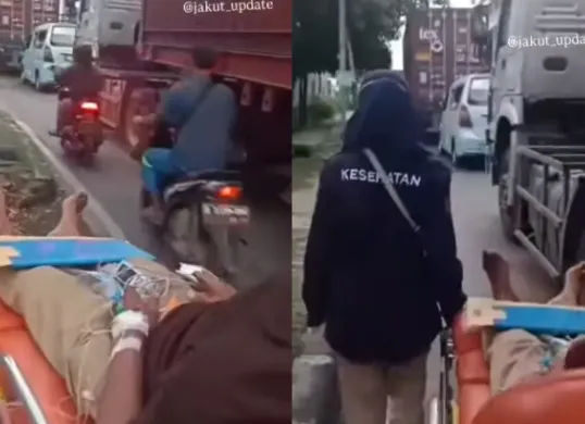 Seorang pasien terpaksa diturunkan dari ambulans yang terjebak macet di Tanjung Priok. (Sumber: Tangkap Layar Instagram/@jakut_update)