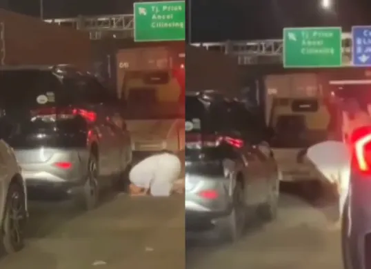 Momen seorang pengendara mobil turun dari mobilnya untuk melaksanakan salat di tengah tol karena terjebak macet arah Pelabuhan Tanjung Priok. (Sumber: Tangkap Layar Instagram/@funnelmedia)