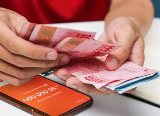 Pinjaman online dengan agunan sebagai upaya mitigasi risiko gagal bayar di sektor fintech Indonesia. (Sumber: Pinterest)