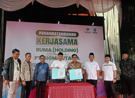 Penandatanganan kerja sama GP Ansor dan perusahaan BUMN di bidang perlindungan konstruksi dan bangunan di Citeureup, Kabupaten Bogor, Jumat, 8 Agustus 2025. (Sumber: Poskota/Giffar Rivana)