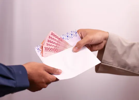 Bagaimana skema gaji dan tunjangan PPPK Paruh Waktu? Sistem pembayaran bulanan, acuan UMP, tunjangan, dan jam kerja. (Sumber: Pexels/Derfino Maasy)
