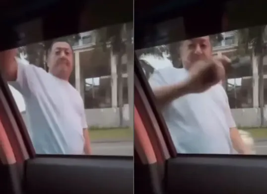 Aksi pria mencoba memecahkan kaca dan membuka pintu mobil pengendara lain. (Sumber: Tangkap Layar Instagram/@medsoszone)