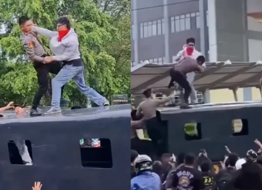 Momen seorang pendemo terlibat perkelahian dengan anggota polisi di atas truk saat demo Tolak RUU TNI di Manado. (Sumber: Tangkap Layar X/@NenkMonica, @zoelfick)