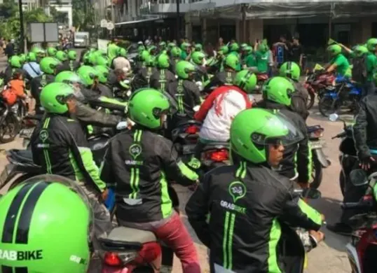 Aktivis 98 dukung aksi nasional ojol 20 Mei 2025, tolak eksploitasi berkedok kemitraan digital dan desak aplikator turunkan potongan jadi maksimal 10% demi keadilan pekerja. (Sumber: Pinterest)
