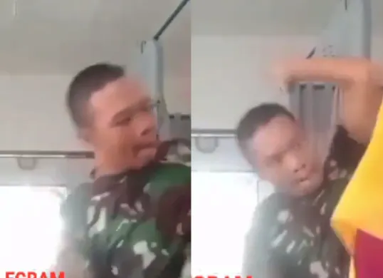 Seorang pria berbaju loreng melakukan tindak kekerasan kepada seorang bidan di Labuhanbatu, Sumatera Utara. (Sumber: Tangkap Layar Instagram/@medsoszone)