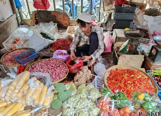 Ilustrasi pedagang sayuran di Pasar Baru Bekasi. (Sumber: Poskota/Nurpini Aulia Rapika)