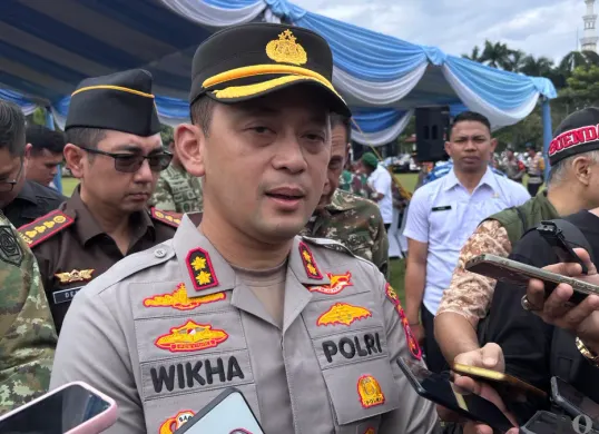 Kapolres Bogor AKBP Wikha Ardilestanto mengungkap identitas pria yang ditemukan tewas di Citeureup Bogor. (Sumber: Poskota/Giffar Rivana)
