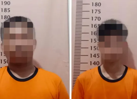 Polisi saat mengamankan pelaku di Polsek Karawaci. (Sumber: Istimewa)