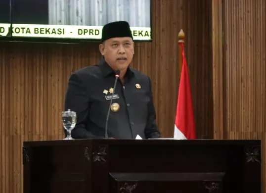 Wali Kota Bekasi, Tri Adhianto dalam Rapat Paripurna DPRD Kota Bekasi, Rabu, 18 Februari 2026. (Sumber: Dok. Pemkot Bekasi)