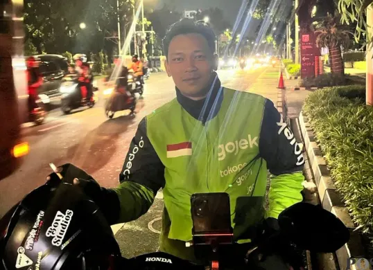 Ilham 26 tahun salah satu ojol. (Sumber: Poskota/M Tegar Jihad)