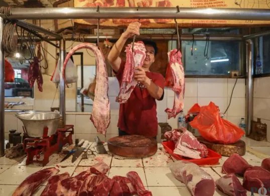 Ilustrasi pedagang daging sapi. (Sumber: Poskota/Bilal Nugraha Ginanjar)
