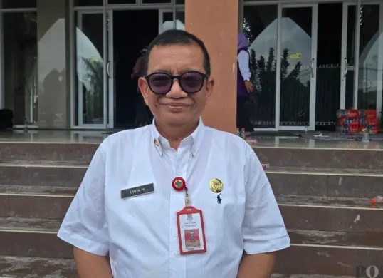 Kepala Dinas Bina Marga dan Sumber Daya Air Kabupaten Tangerang, Iwan Firmansyah. (Sumber: Poskota/Veronica Prasetio)