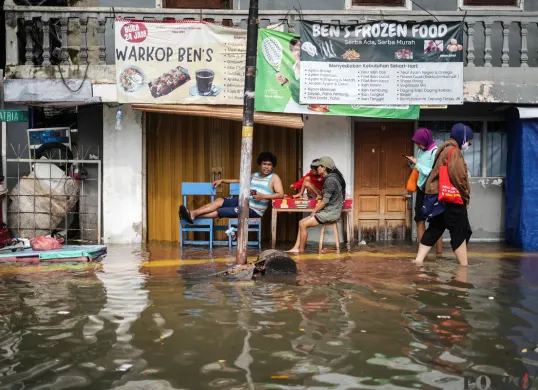 Situasi banjir di wilayah Jakarta. (Sumber: Poskota/Bilal Nugraha Ginanjar)