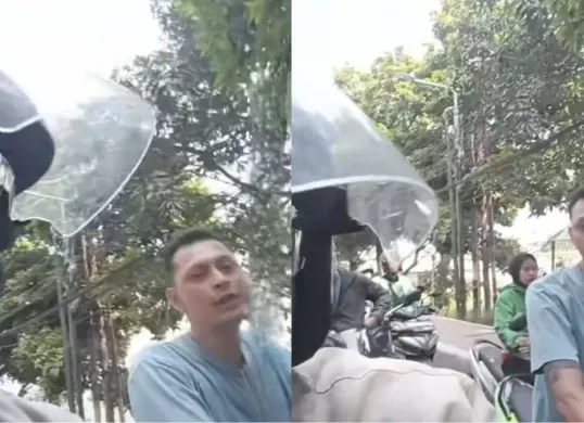 Seorang pemotor (tanpa helm) diduga melakukan penganiayaan kepada sesama pengendara di kawasan Jagakarsa, Jakarta Selatan. (Sumber: Dok. Istimewa)