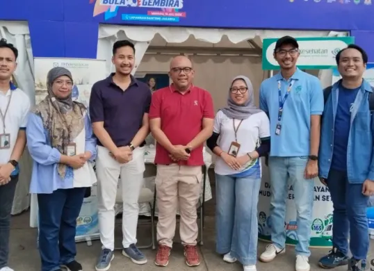 Direktur Kepesertaan Akmal Budi Yulianto (tengah) ajak masyarakat untuk cegah Sadikin sejak dini di Lapangan Banteng, Minggu, 19 Juli 2026. (Sumber: Poskota/ Heri Effendi)
