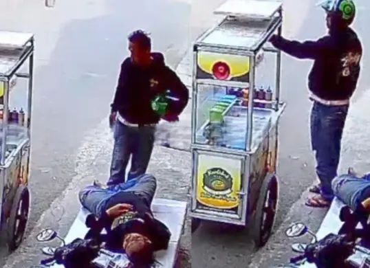Seorang pedagang martabak mini menjadi korban pencurian saat tertidur di samping gerobaknya di Jalan AMD Raya, Pesanggrahan, Jakarta Selatan, pada Selasa, 28 Juli 2026 siang. (Sumber: Istimewa)