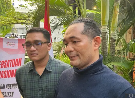 Potret pengamat politik Bonie Hargens saat menghadiri diskusi bertajuk ''Persatuan Nasional' yang digelar Indonesia Millennial Center (IMC) di Jakarta Pusat, Senin, 22 Juni 2026. (Sumber: Poskota/Pandi Ramedhan)