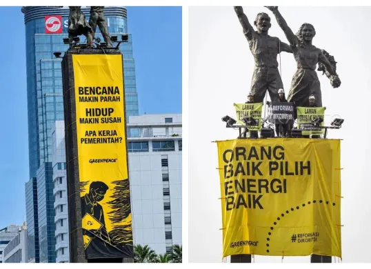 Aktivis Greenpeace membentangkan spanduk protes dari atas Patung Selamat Datang pada Selasa, 20 Oktober 2026. (Sumber: X/@ejaaipongg)
