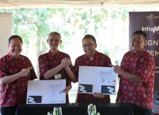 Prosesi penandatanganan Berita Acara Kesepakatan (BAK) antara InfraNexia dan Lintasarta di sela penyelenggaraan Bali Annual Telkom International Conference (BATIC) 2026 di Nusa Dua, Bali (26/8). (Sumber: Istimewa)