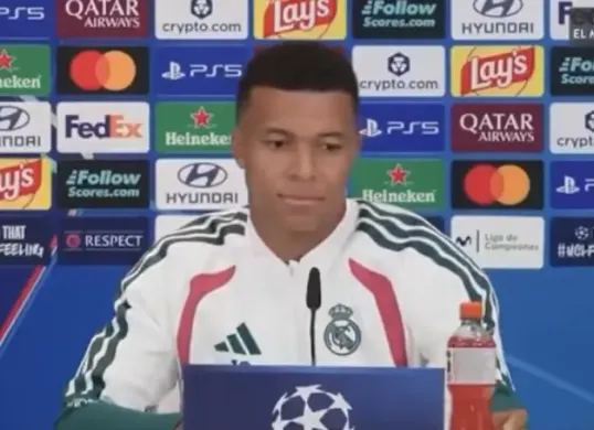 Kylian Mbappe menjadi sorotan setelah menggeser botol minuman olahraga dalam konferensi pers Real Madrid menjelang laga Liga Champions. (Sumber: X/@ArobaseGiovanny)