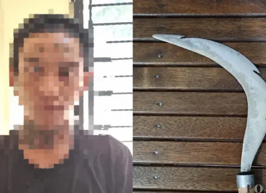 Pelaku penganiayaan berinisial AS alias Bagol, 34 tahun diamankan di Polsek Beji, Depok, usai membacok pacarnya menggunakan celurit. (Sumber: Pos Kota/ Angga)