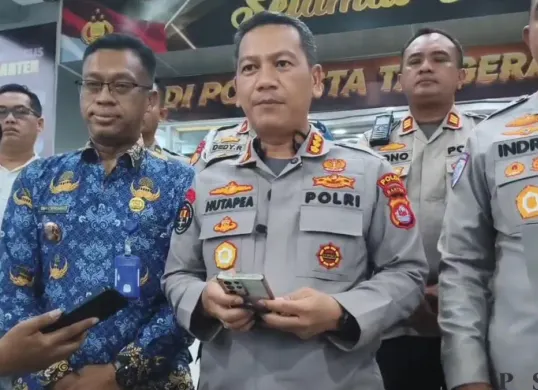 Kabid Humas Polda Banten Kombes Pol Maruli Hutapea saat memberikan keterangan usai melakukan koordinasi depan pihak-pihak tertentu. (Sumber: Pos Kota/ Veronica)